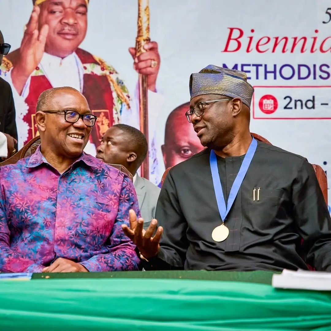 Peter Obi seated beside Governor Seyi Makinde at a church conference, both wearing medals