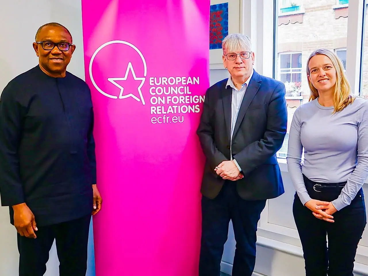Peter Obi standing with three people beside a European Council on Foreign Relations banner