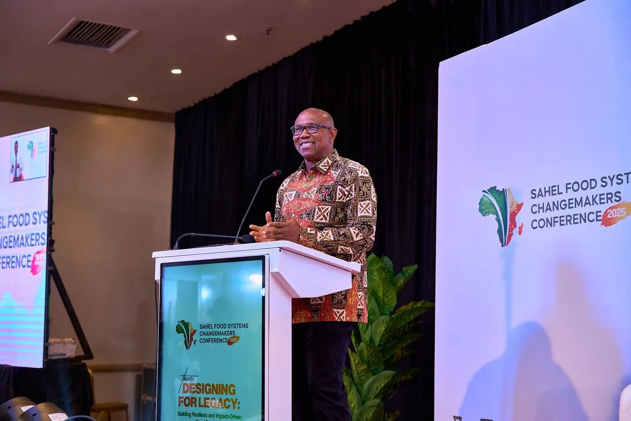 Peter Obi speaking at a lectern in front of a screen reading Sahel Food Systems Changemakers Conference